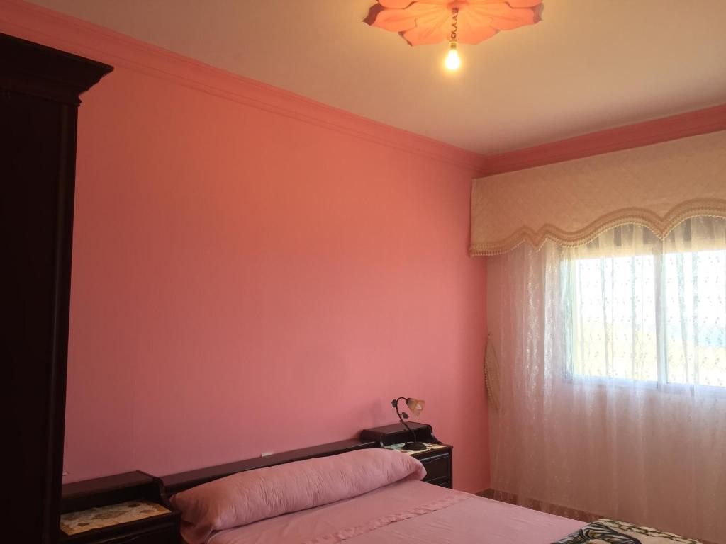 Postel nebo postele na pokoji v ubytování Casa Dina