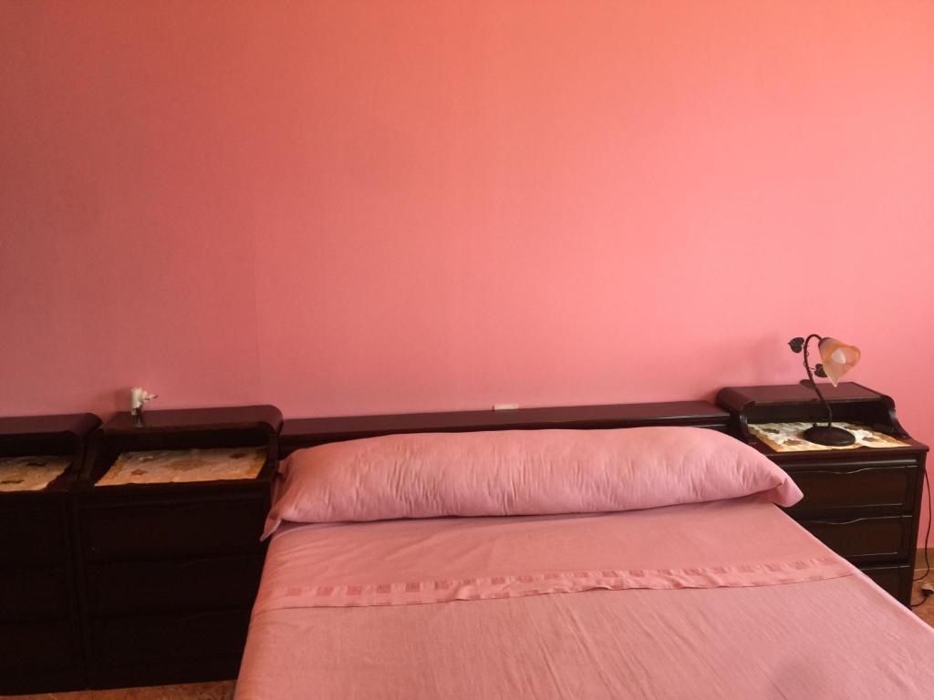 Postel nebo postele na pokoji v ubytování Casa Dina