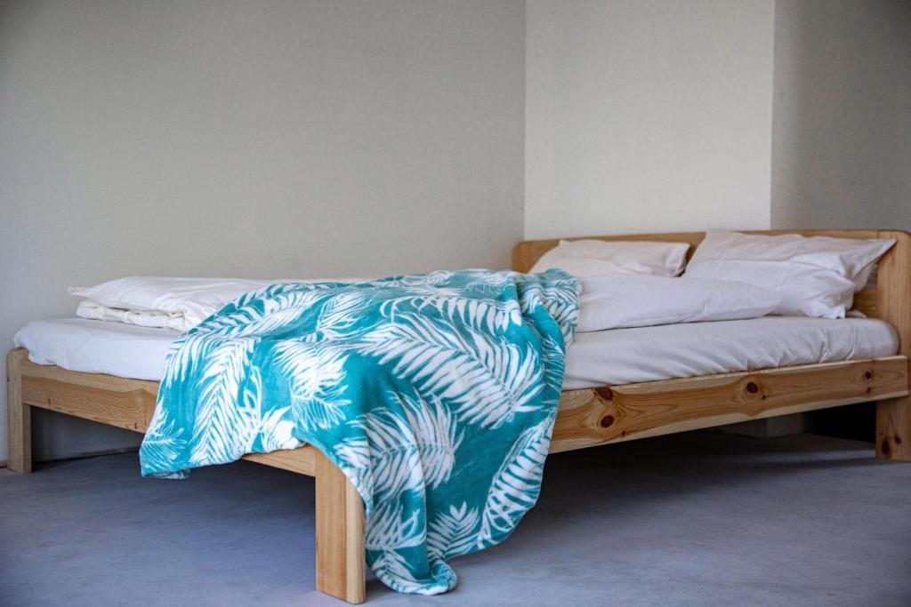 Ένα ή περισσότερα κρεβάτια σε δωμάτιο στο Plateliai Samogitia Barn