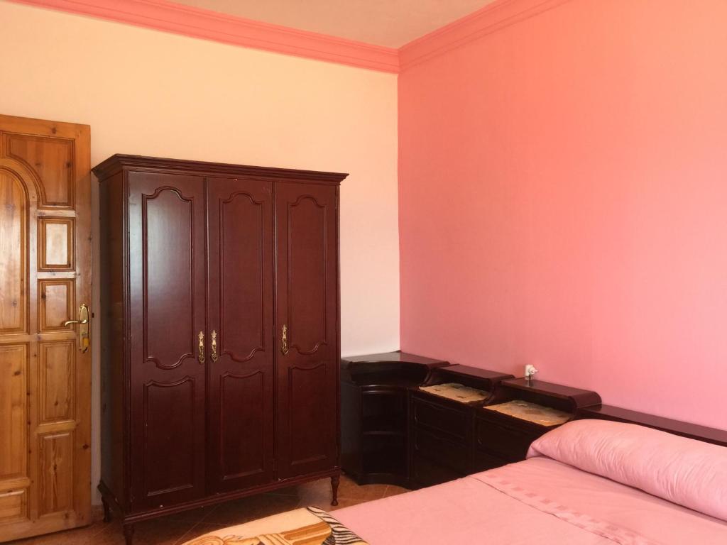 Postel nebo postele na pokoji v ubytování Casa Dina