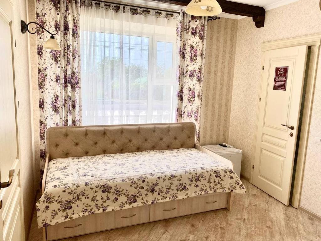 Postel nebo postele na pokoji v ubytování Green Hall Hotel