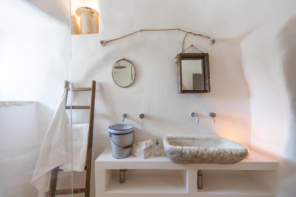 Kúpeľňa v ubytovaní Trulli 18cinquantanove