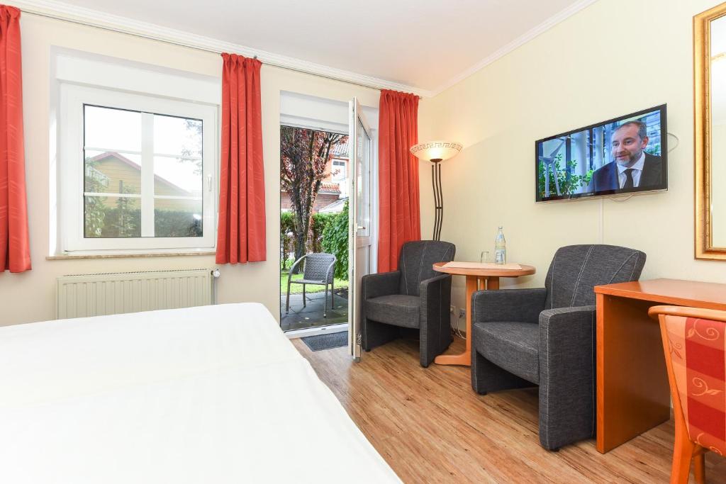 TV a/nebo společenská místnost v ubytování Hotel Garni Benser Watt