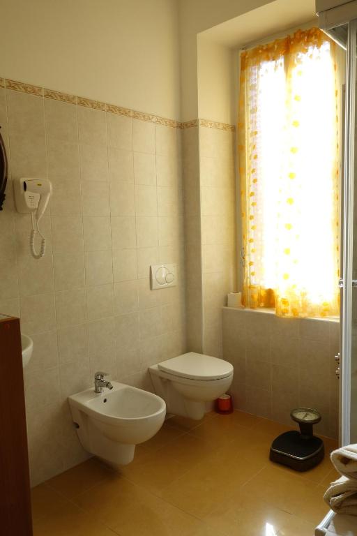 Koupelna v ubytování Hotel Roma