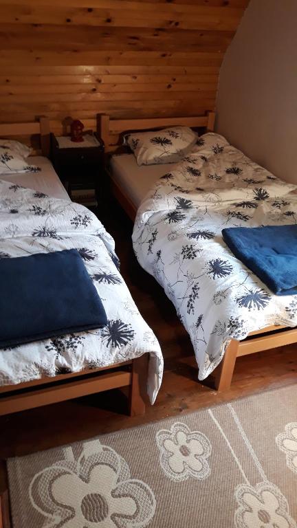 Postel nebo postele na pokoji v ubytování vila Borova glava