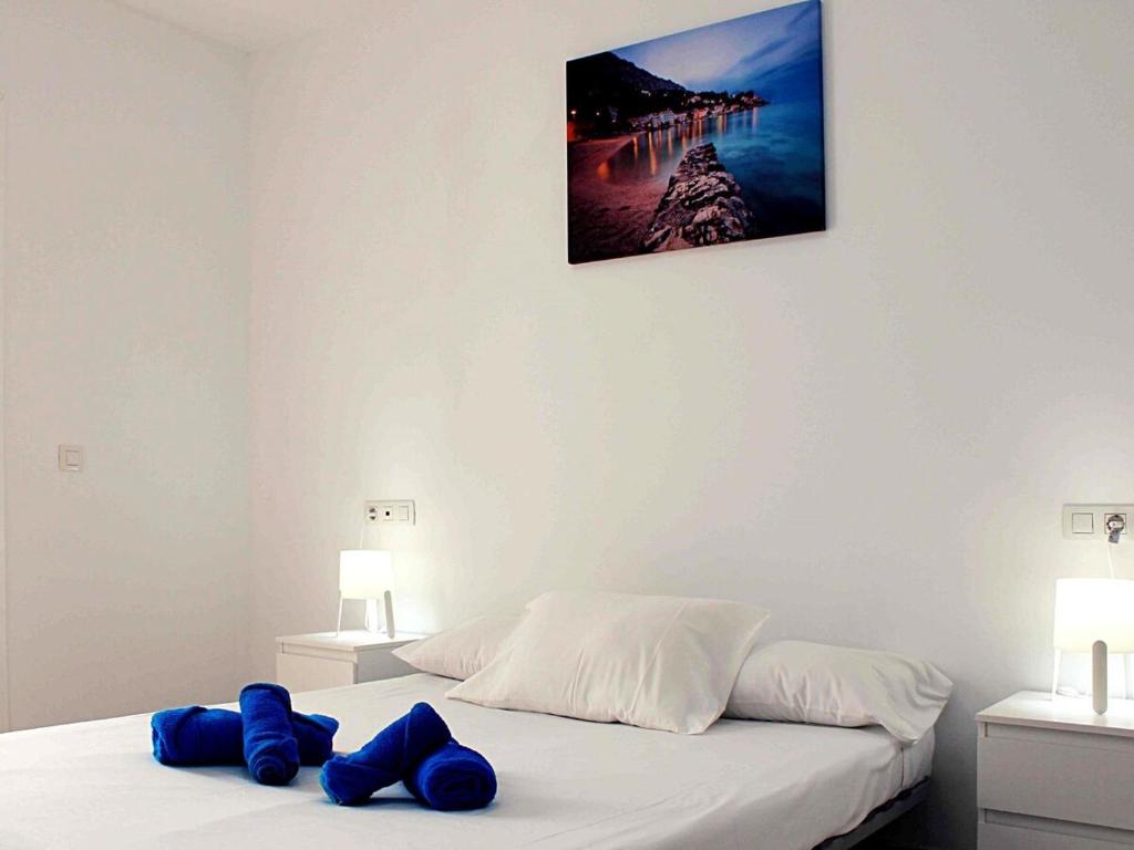 SFJ Apartamento Arrecife tesisinde bir odada yatak veya yataklar