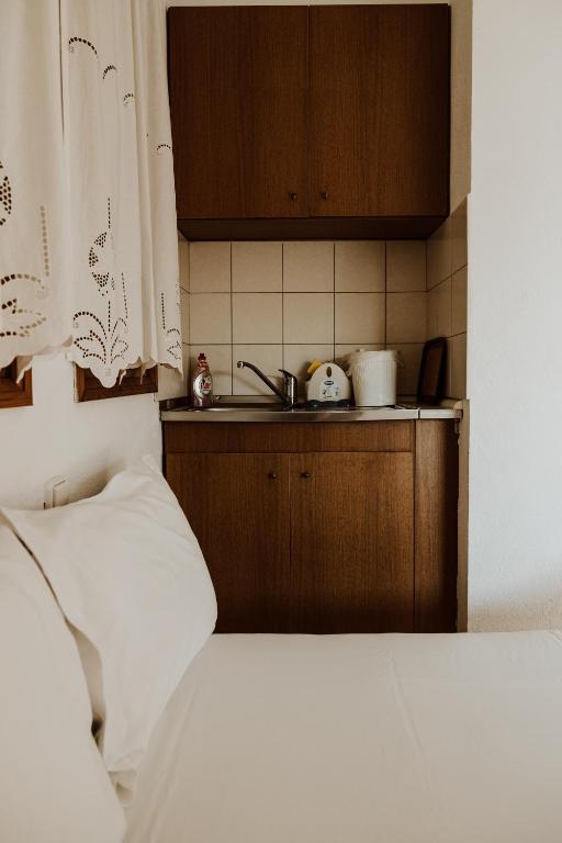 Postel nebo postele na pokoji v ubytování Filippos Rooms Afissos