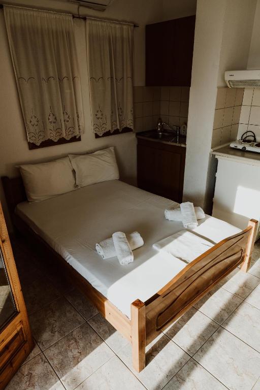 Postel nebo postele na pokoji v ubytování Filippos Rooms Afissos