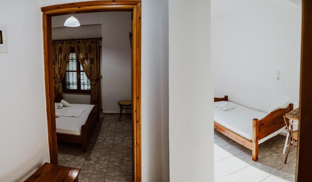 Postel nebo postele na pokoji v ubytování Filippos Rooms Afissos