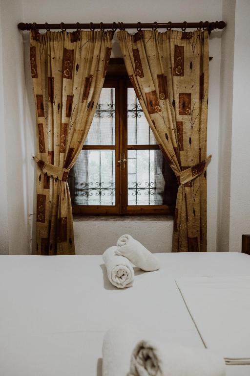 Postel nebo postele na pokoji v ubytování Filippos Rooms Afissos