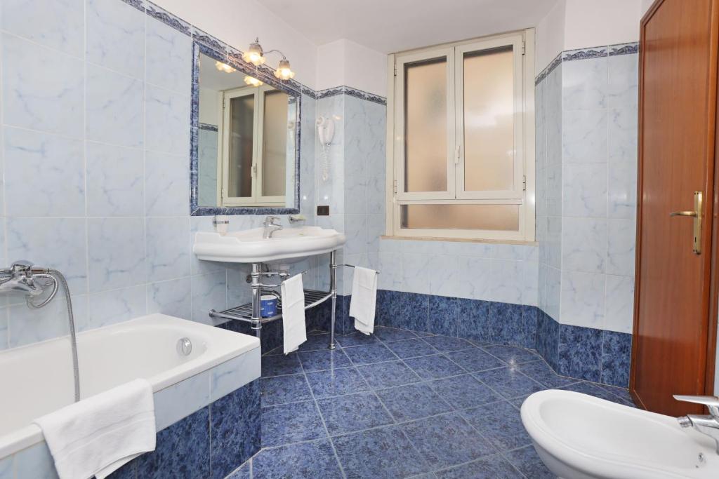 Koupelna v ubytování Hotel Rimini