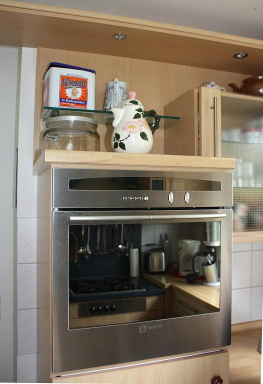 Kuchyň nebo kuchyňský kout v ubytování Haus Tapken mit Meerblick