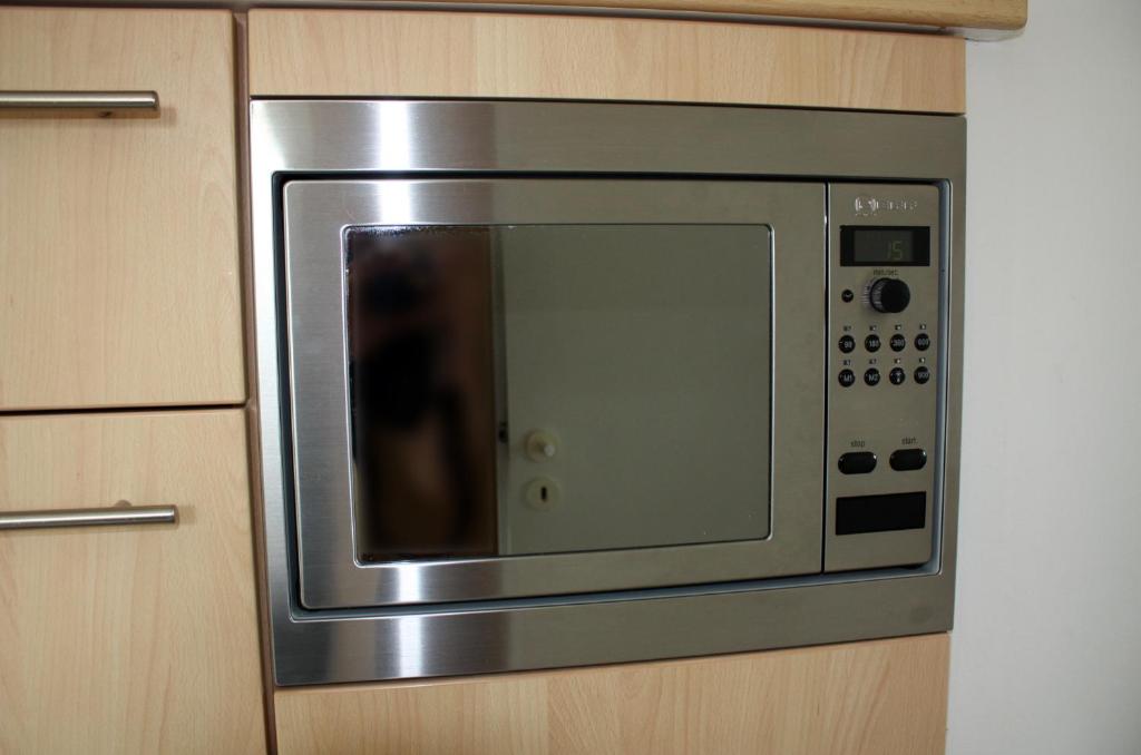 Kuchyň nebo kuchyňský kout v ubytování Haus Tapken mit Meerblick