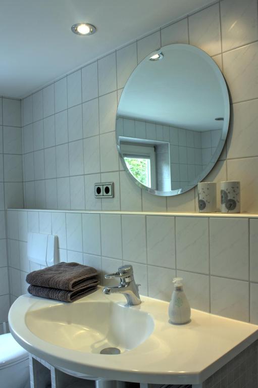 Koupelna v ubytování Haus Tapken mit Meerblick