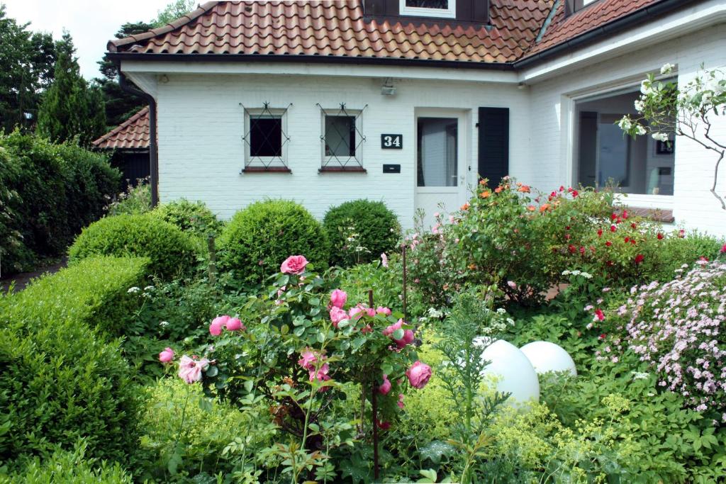 Zahrada ubytování Haus Tapken mit Meerblick