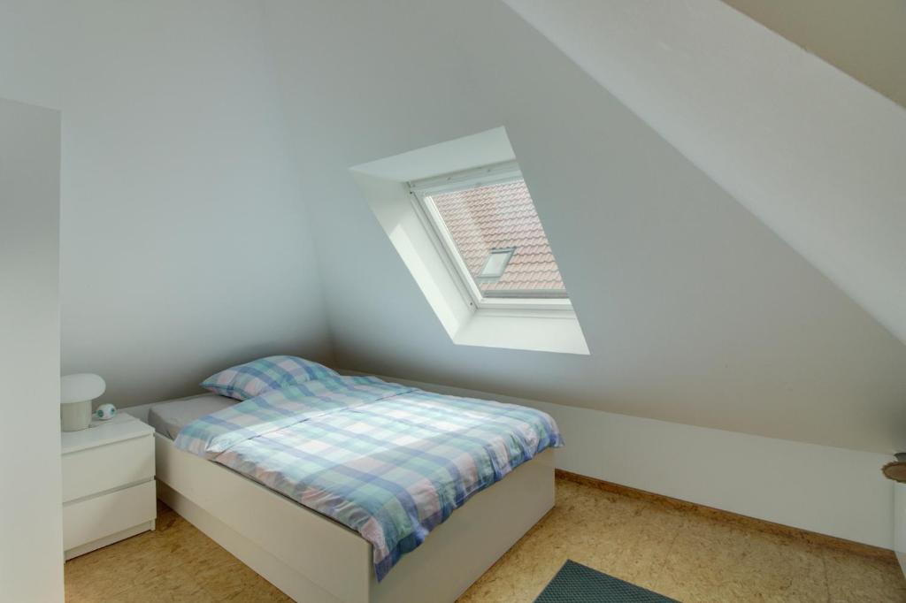Postel nebo postele na pokoji v ubytování Haus Tapken mit Meerblick