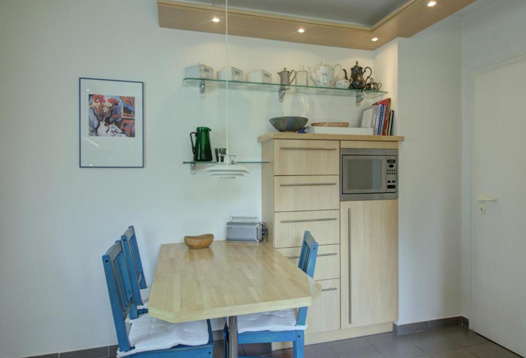 Kuchyň nebo kuchyňský kout v ubytování Haus Tapken mit Meerblick