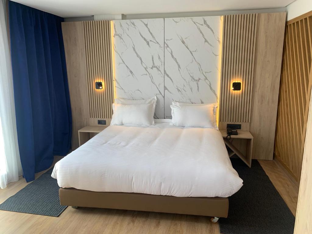 Postel nebo postele na pokoji v ubytování Rihab Hotel
