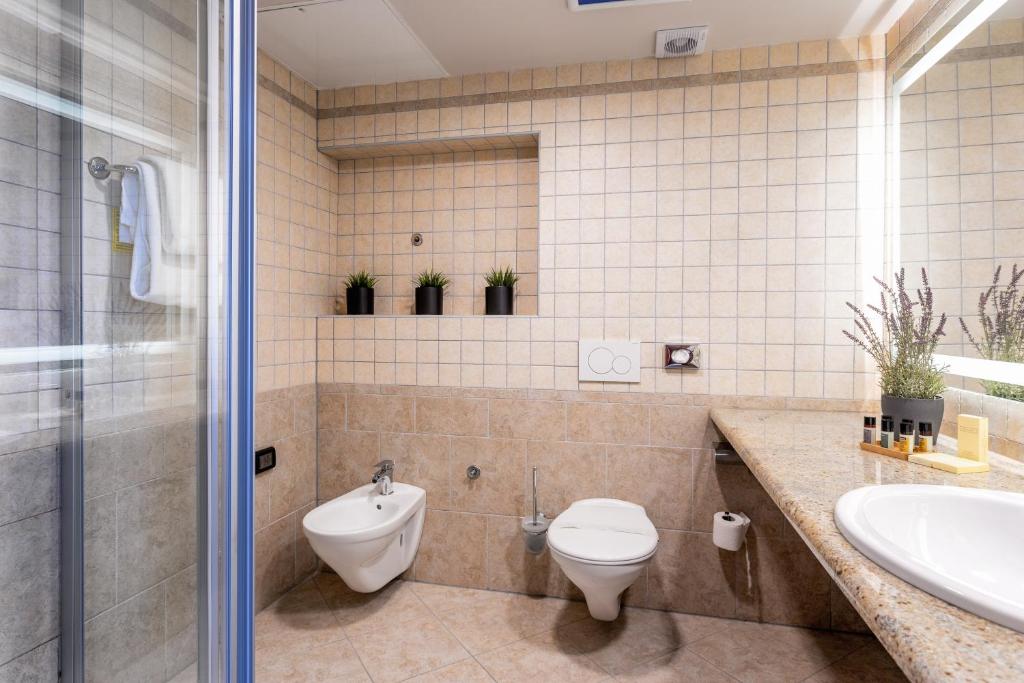Koupelna v ubytování Hotel Podstine