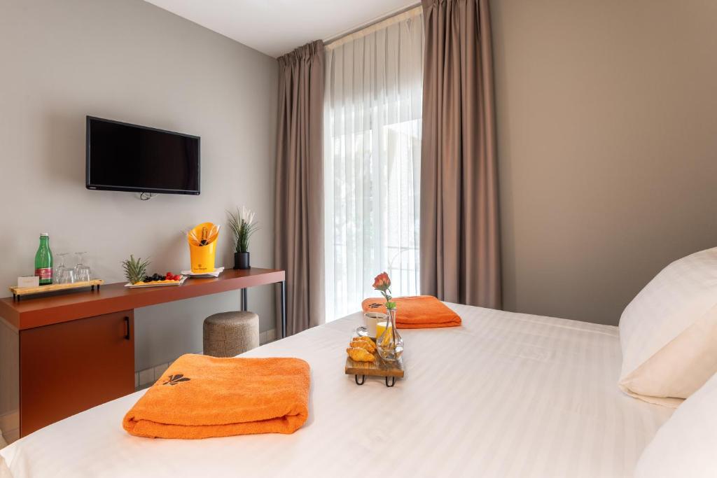 Postel nebo postele na pokoji v ubytování Hotel Podstine