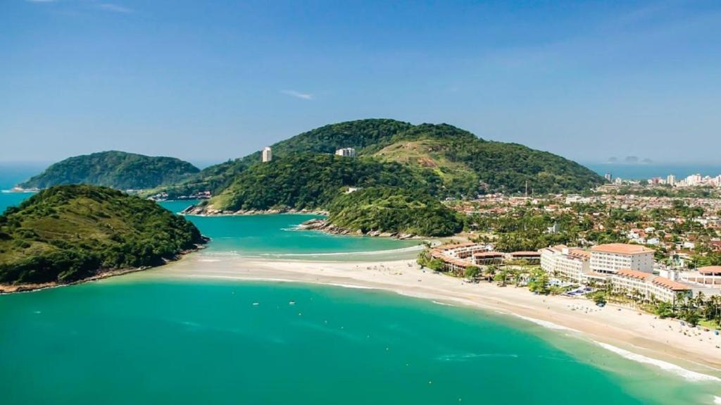 an aerial view of a beach in the ocean at Pousada Vila Novo Tempo in Guarujá