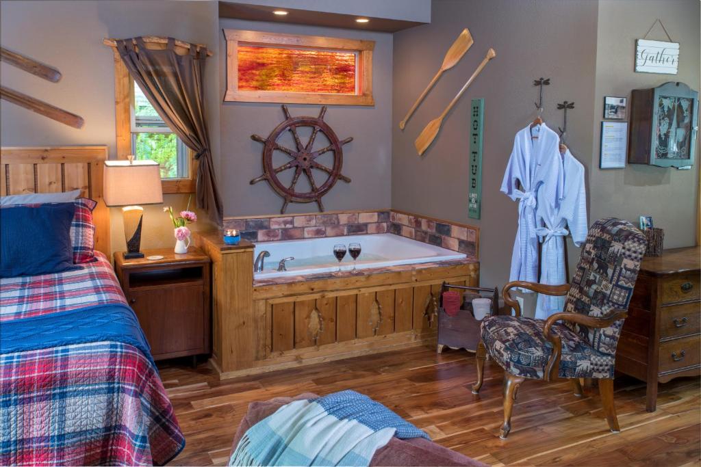 Postel nebo postele na pokoji v ubytování Eureka Sunset Cabins