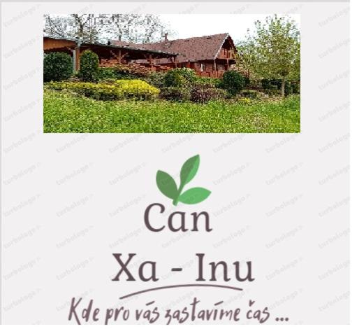 a picture of a house with a sign that says can x va inn at Chata Xa-Inu in Sedliště