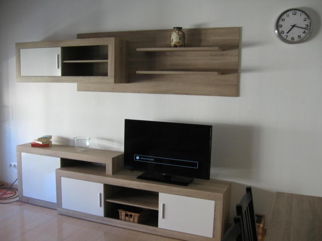 TV a/nebo společenská místnost v ubytování Duplex junto a un Parque