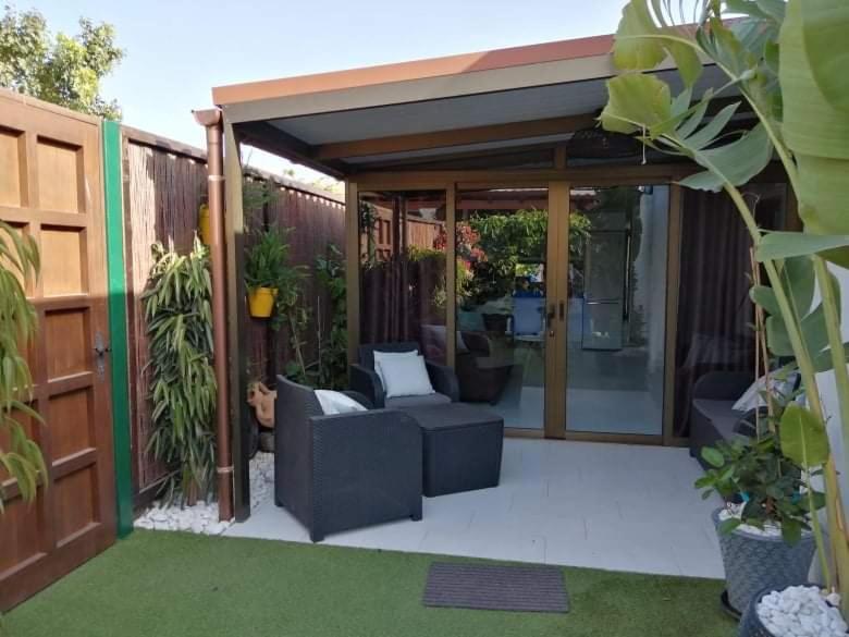 A garden outside Bungalow Atos With Private Garden