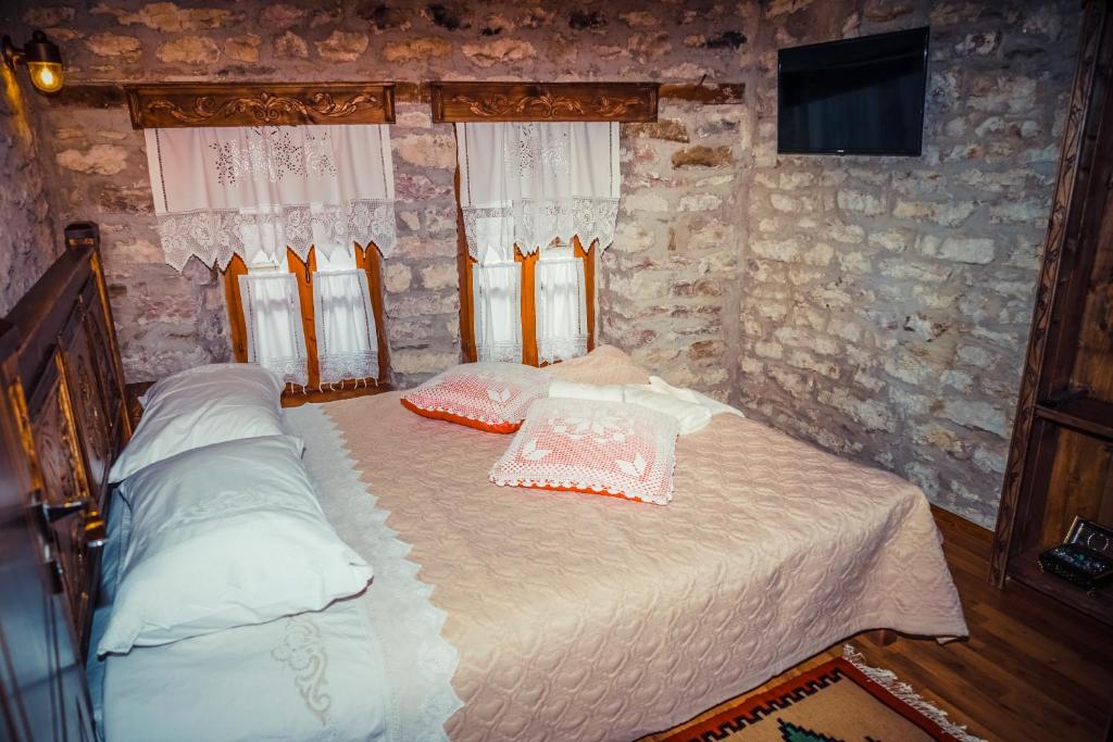 Postel nebo postele na pokoji v ubytování Medieval Rooms