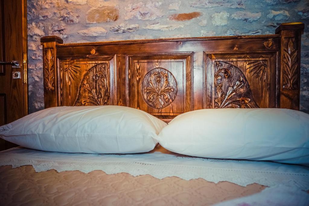 Postel nebo postele na pokoji v ubytování Medieval Rooms