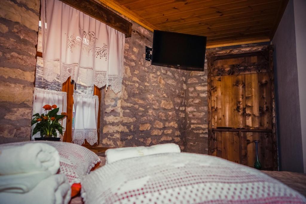 Postel nebo postele na pokoji v ubytování Medieval Rooms