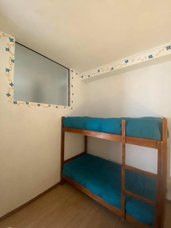 Palanda nebo palandy na pokoji v ubytování Hostal Chaska Wasi