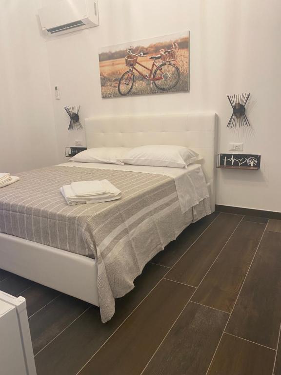 Postel nebo postele na pokoji v ubytování B&B Libertà