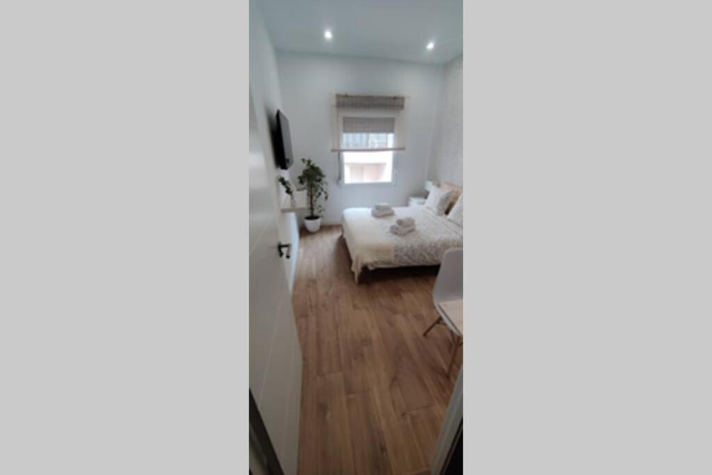 TV a/nebo společenská místnost v ubytování Xátiva Home, Loft Center