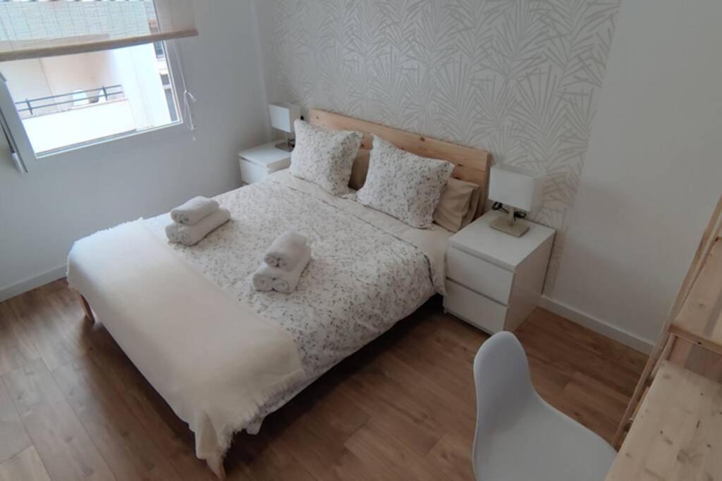 Postel nebo postele na pokoji v ubytování Xátiva Home, Loft Center