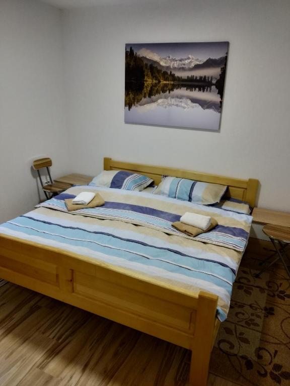 Postel nebo postele na pokoji v ubytování Guest House RG
