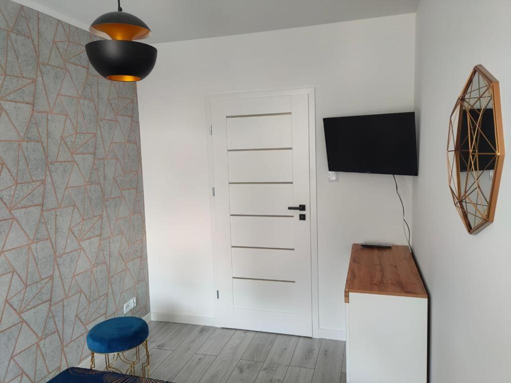 Televízia a/alebo spoločenská miestnosť v ubytovaní Haven Apart 2