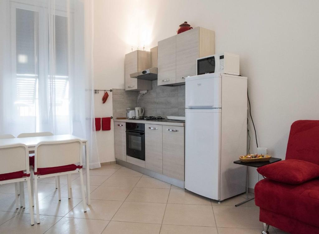 Kuchyňa alebo kuchynka v ubytovaní Principe Apartment