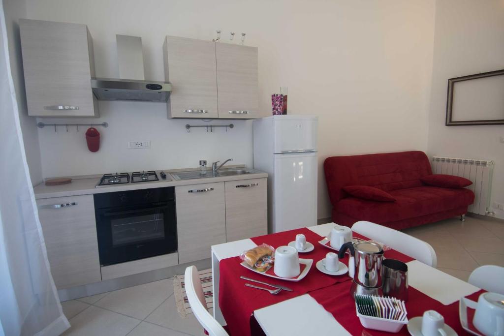 Kuchyňa alebo kuchynka v ubytovaní Principe Apartment