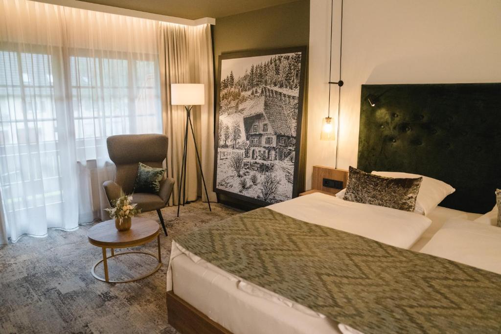 Postel nebo postele na pokoji v ubytování Landhotel Hirschen