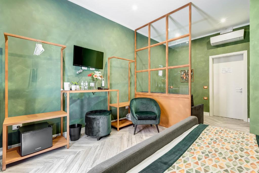 Telewizja i/lub zestaw kina domowego w obiekcie Ripetta Natural Suites