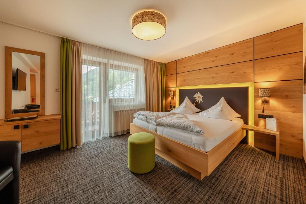 Posteľ alebo postele v izbe v ubytovaní Kräuterhotel Hochzillertal