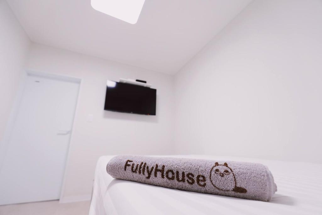 Postel nebo postele na pokoji v ubytování Fully Mini Hotel