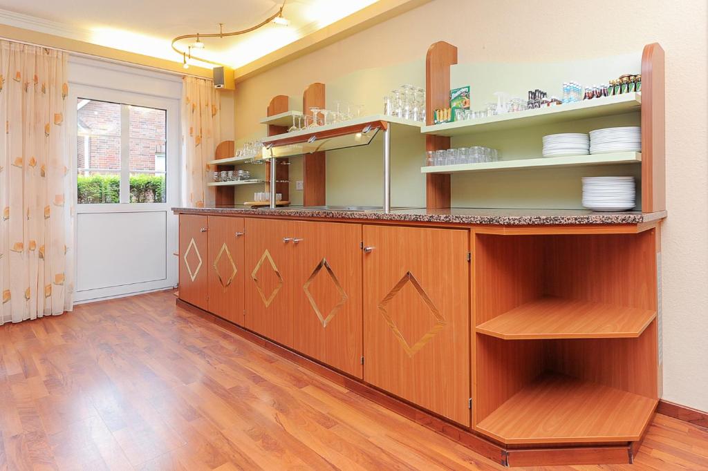 Kuchyň nebo kuchyňský kout v ubytování Hotel Garni Benser Watt