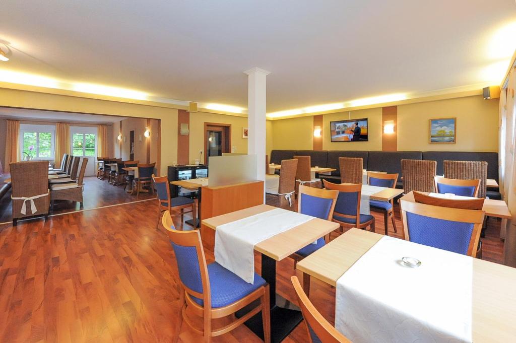 TV a/nebo společenská místnost v ubytování Hotel Garni Benser Watt