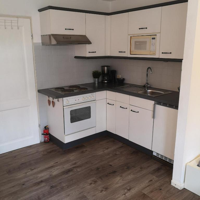 Kuchyň nebo kuchyňský kout v ubytování Gemütliche Wohnung in Wolfegg - Das Tor zum Allgäu