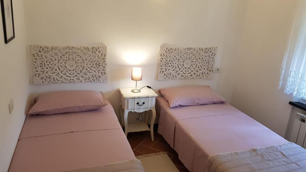 A bed or beds in a room at Casa Michelle "Natura e Relax"