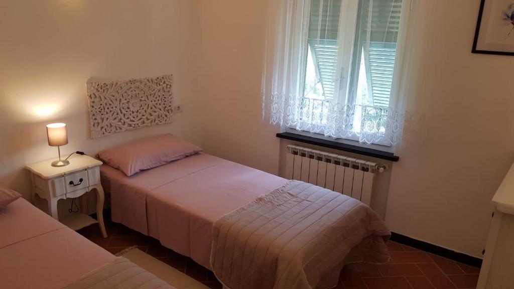 A bed or beds in a room at Casa Michelle "Natura e Relax"