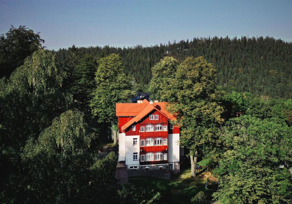 an aerial view of a house in the middle of a forest at Willa Dąbrówka in Karpacz